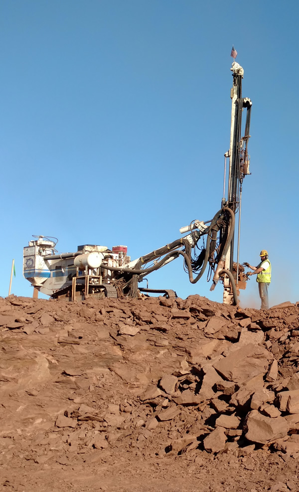 Baystate Blasting drill rig operating on a construction site